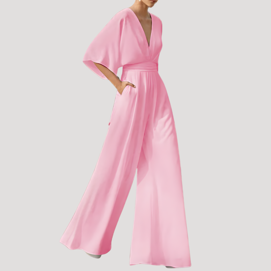 Flowy Celeste Women's V-Neck Wide Leg Jumpsuit. Comfortable, elegant, and stylish for versatile summer outfits.