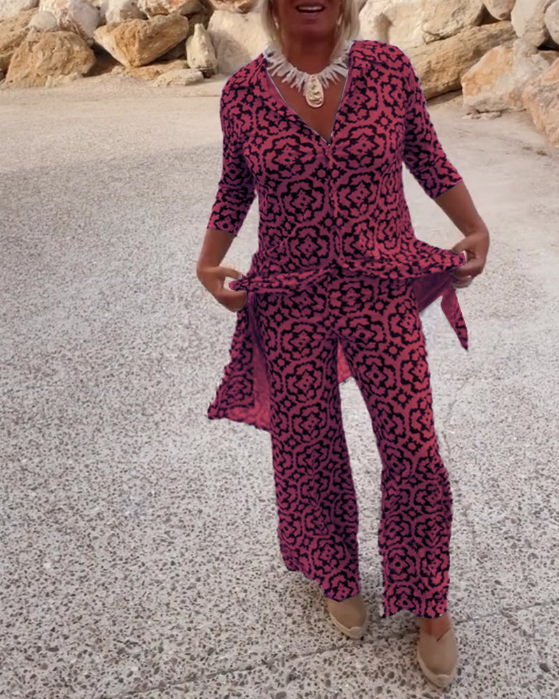 Soft women's printed V-neck tunic & wide-leg pants set, combining comfort with modern fashion.