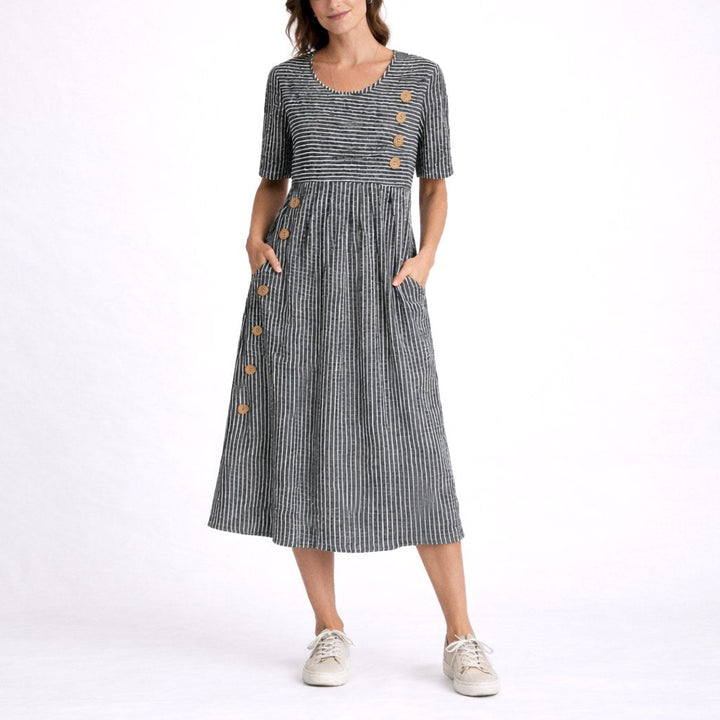 Effortlessly chic women's striped midi dress. Lightweight, comfortable, and perfect for summer fashion.