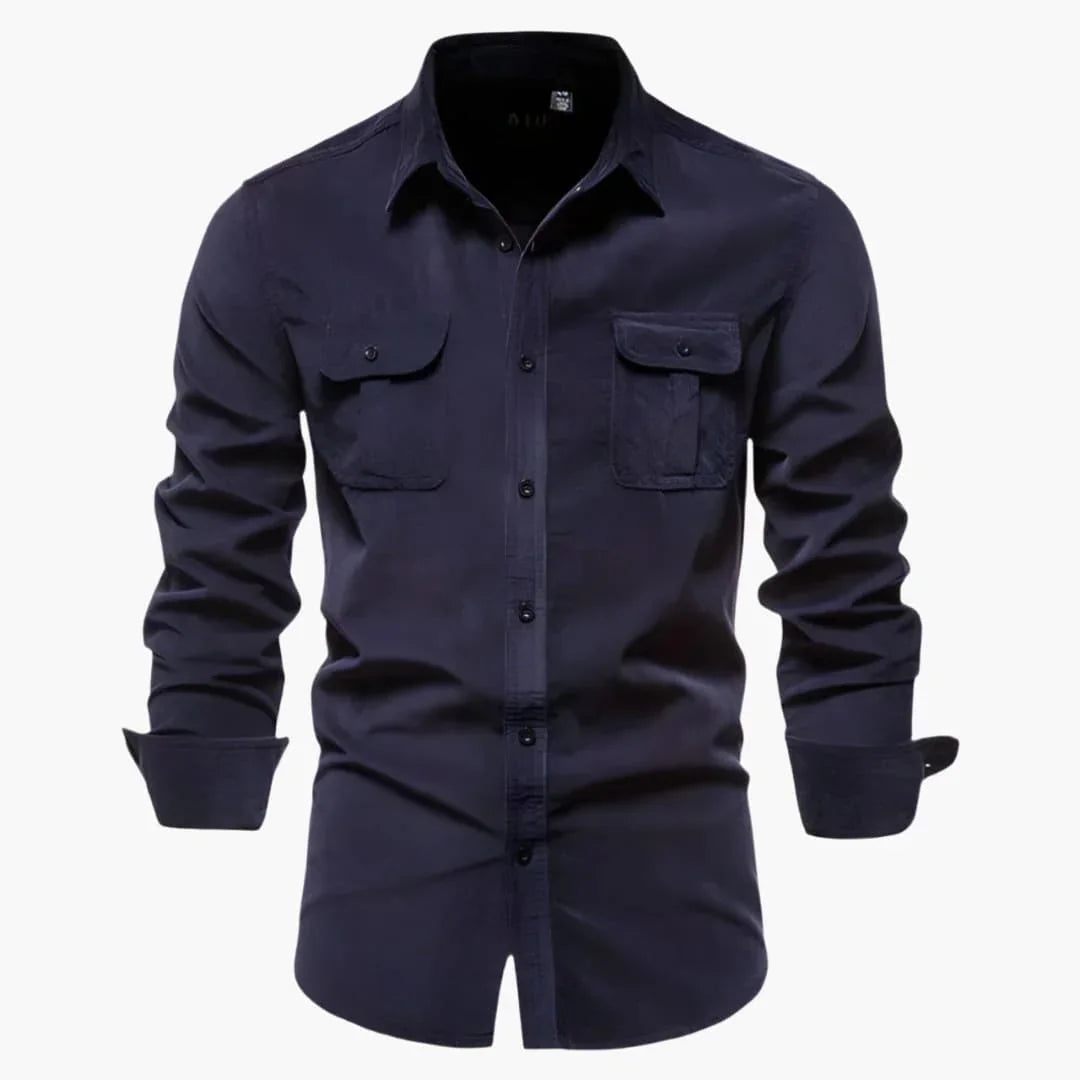 Durable men's long sleeve button-down fishing shirt. Features chest pockets & relaxed fit for outdoor wear.