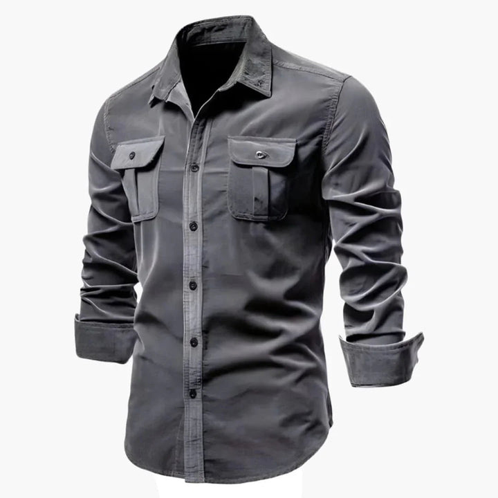 Men's long sleeve workwear shirt, relaxed fit. Button-down, chest pockets for utility and everyday comfort.