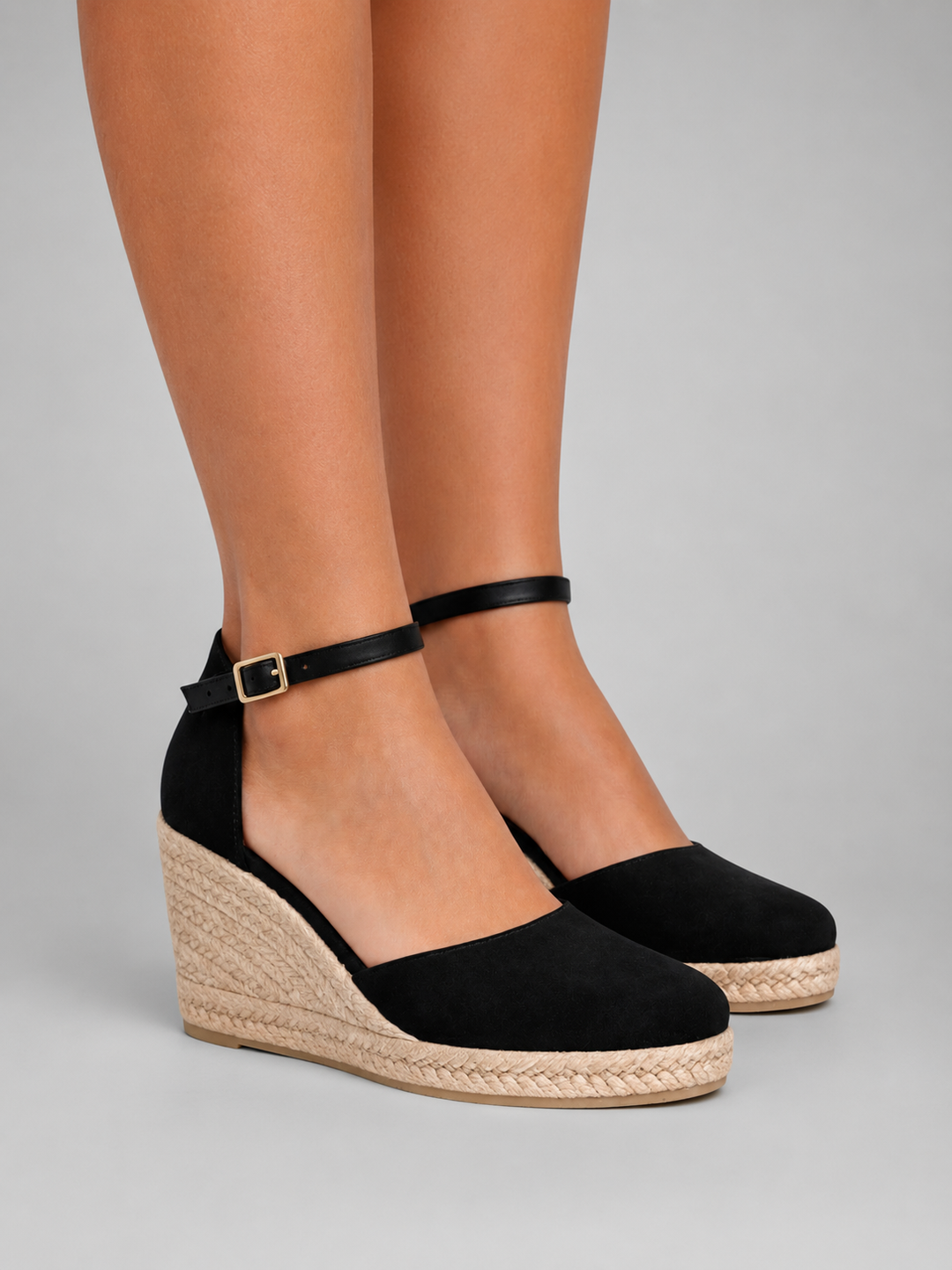 Side view of women's espadrille wedge sandals, showcasing the elegant wedge heel and ankle strap.