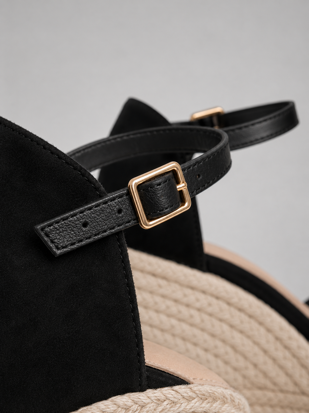 Fashionable women's espadrille wedge sandals offering comfort and classic style for summer.