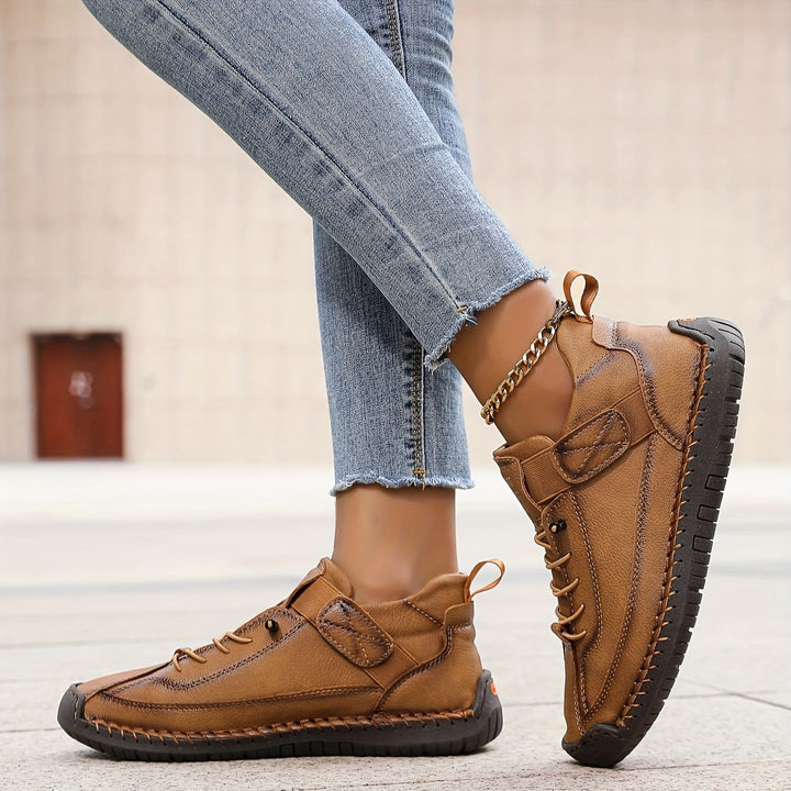 Cushioned women's walking shoes, designed for all-day comfort, support, and orthopedic relief.