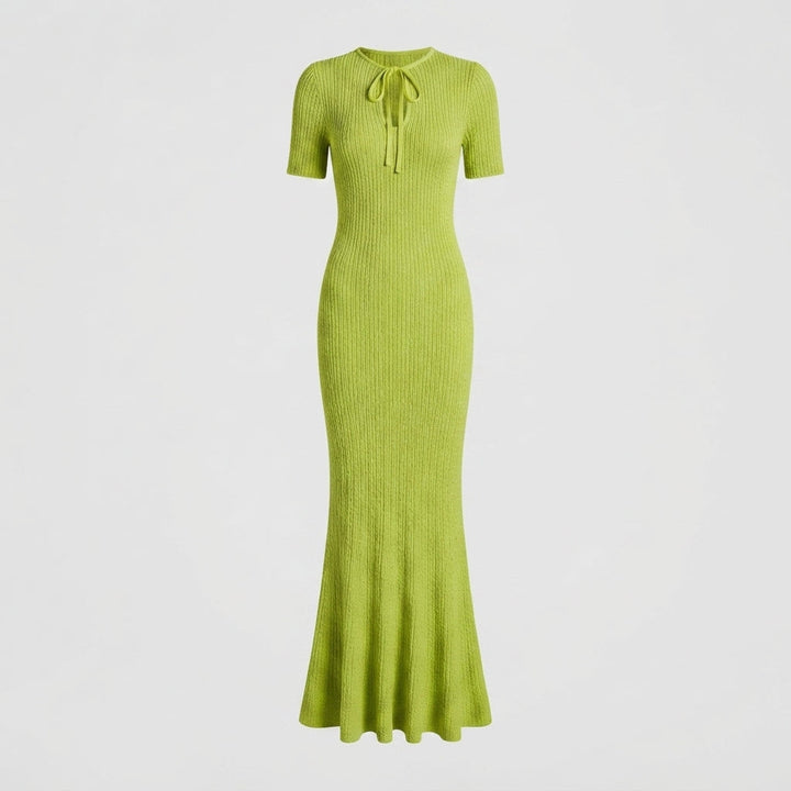 Flattering fitted maxi dress for women. Stylish occasion wear, ideal for garden parties & evening events.