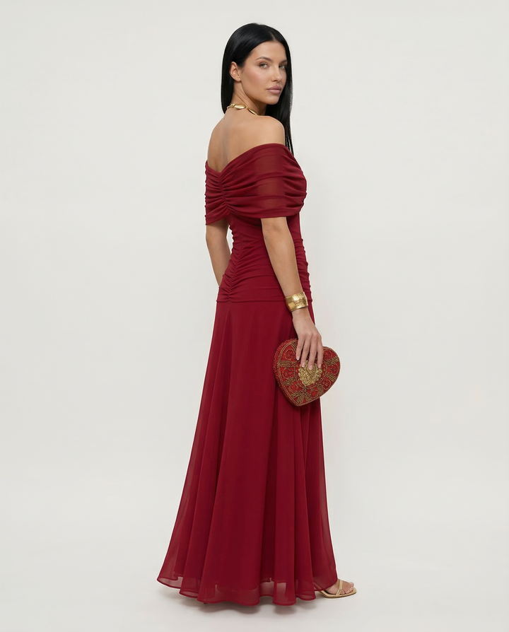 Women's formal off-shoulder ruched maxi dress for elegant race day events.