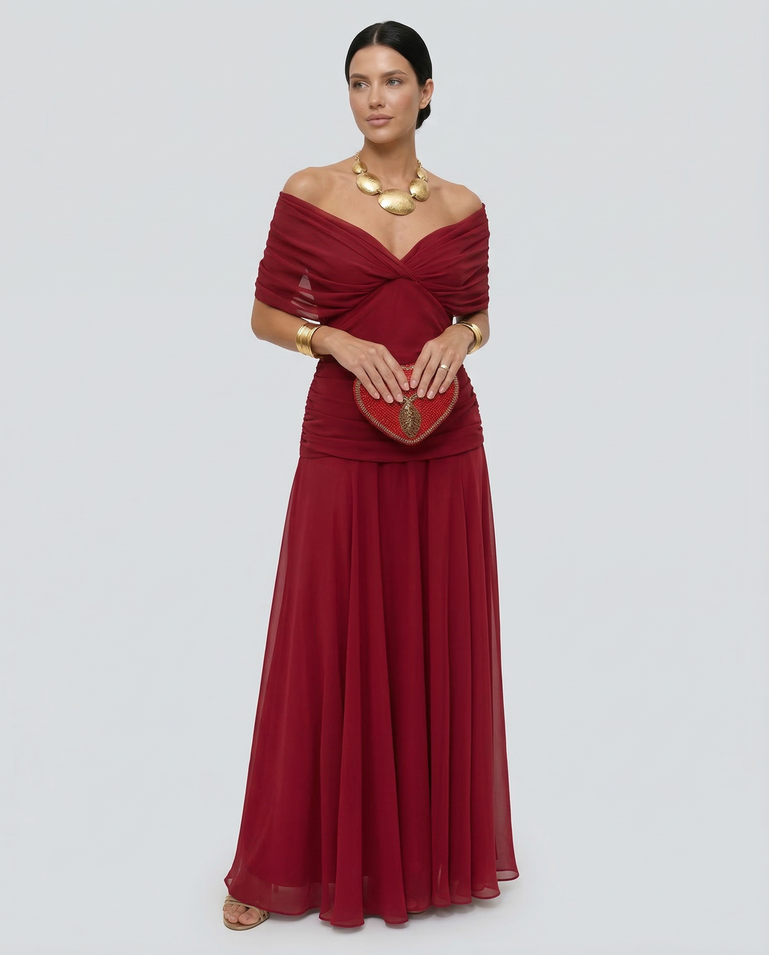 Women's elegant off-shoulder ruched maxi dress, perfect race day attire.