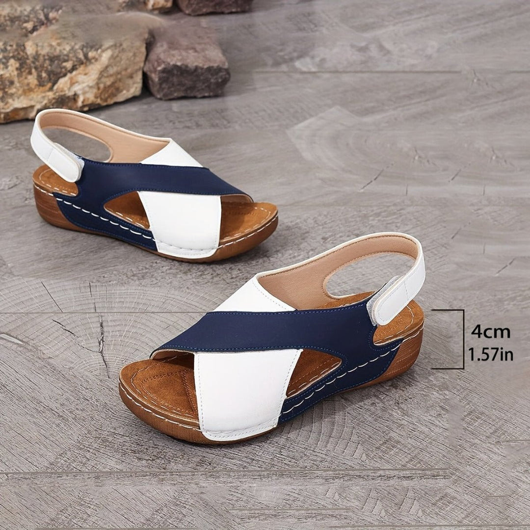 Elegant women's orthopedic wedge sandals, slingback style, offering arch support & cozy comfort.