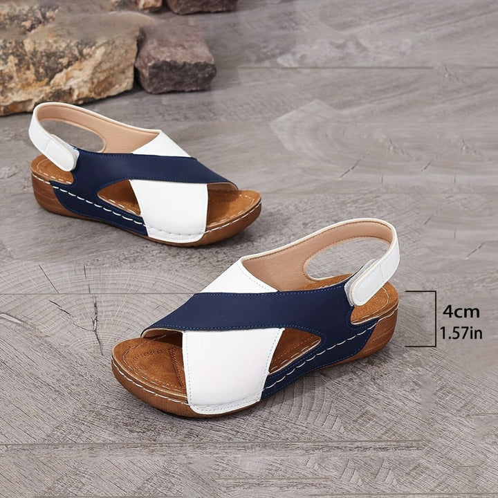 Elegant women's orthopedic wedge sandals, slingback style, offering arch support & cozy comfort.