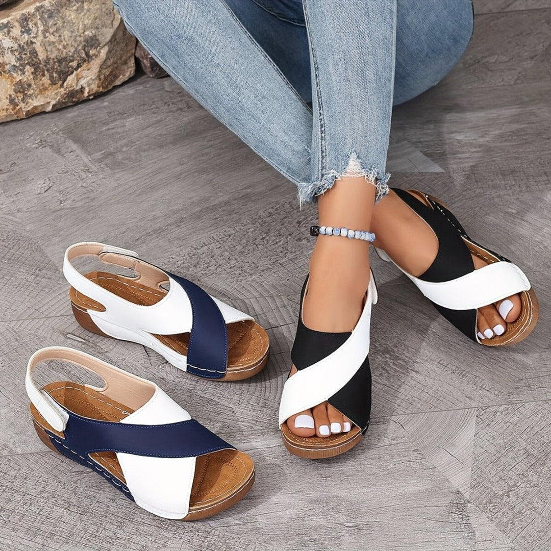 Orthopedic women's wedge sandals with slingback strap, arch support & adjustable comfort for summer.