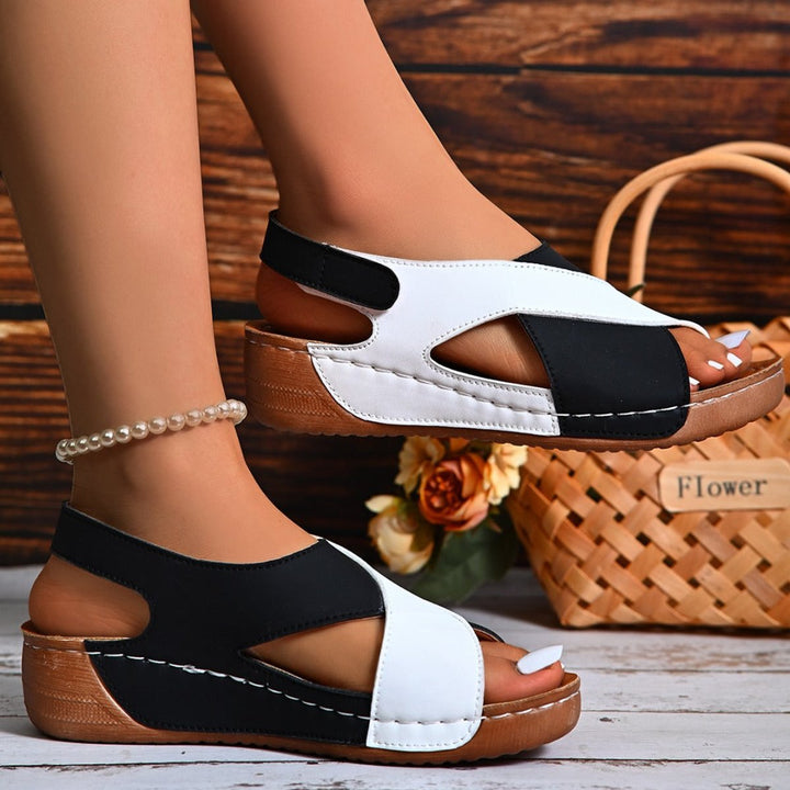 Comfortable women's orthopedic slingback wedge sandals, ideal for everyday wear with arch support.