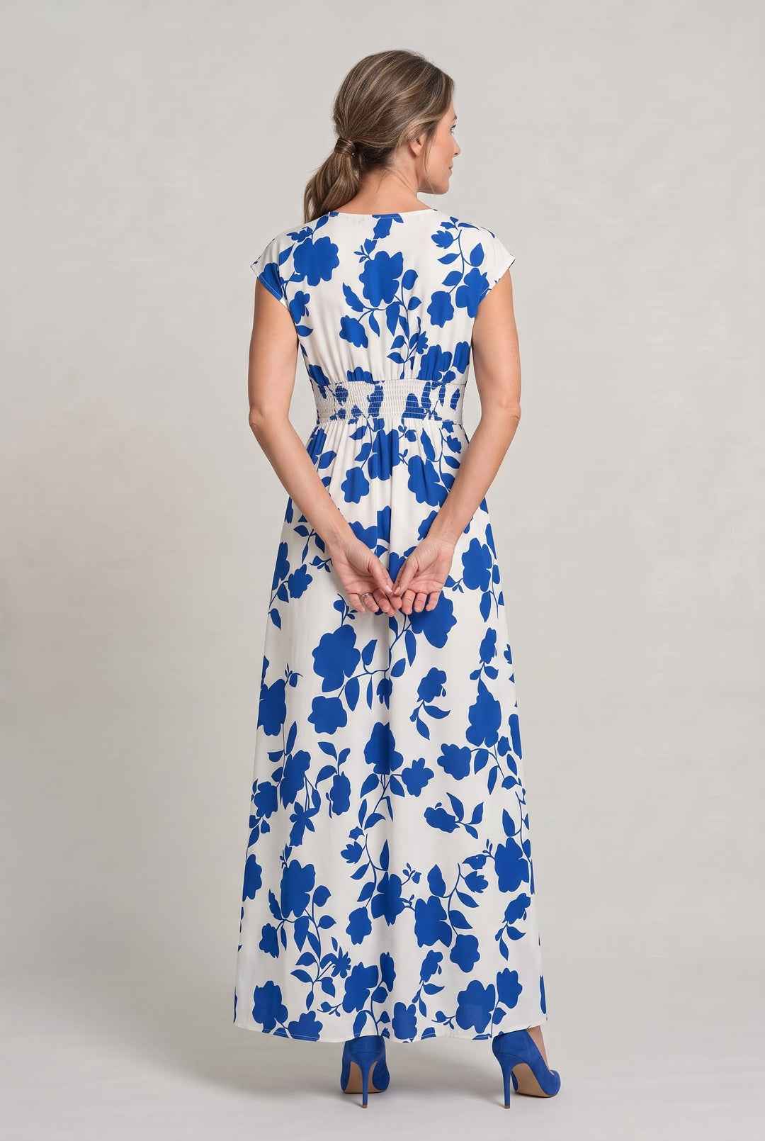 Chic women's floral V-neck maxi dress with smocked waist, an elegant A-line design for summer occasion and race events.