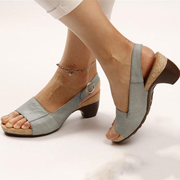 Women's relaxed platform sandals with slingback wedge heel. Comfortable open-toe summer footwear.