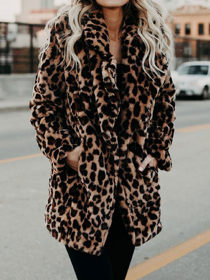 Women's bold leopard print winter coat featuring an elegant oversized collar, ideal for trendy cold-weather outerwear.