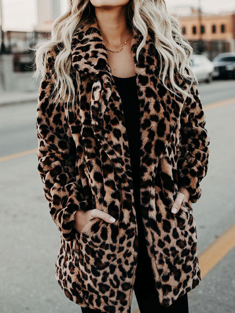Warm women's leopard print winter coat, Sofia style, offering cozy comfort and chic outerwear for cold winter days.