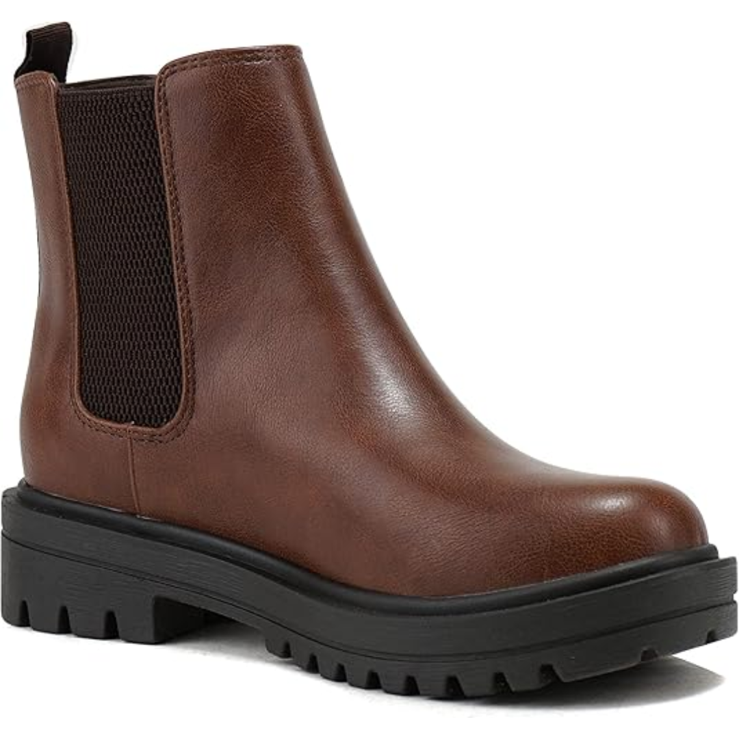 Detail of the low heel on women's Chelsea ankle boots. Comfortable & chic fashion footwear for versatile style.