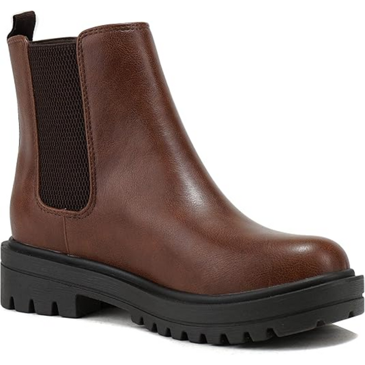 Detail of the low heel on women's Chelsea ankle boots. Comfortable & chic fashion footwear for versatile style.