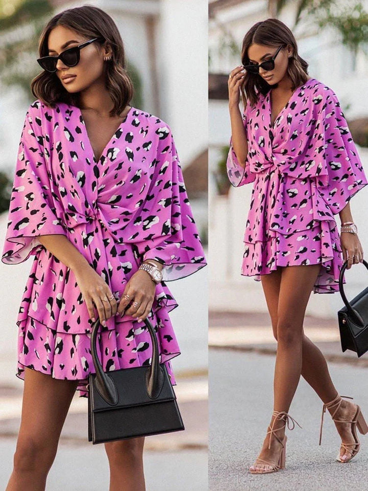 Beautiful women's mini dress, featuring an elegant V-neck and a comfortable, chic silhouette.