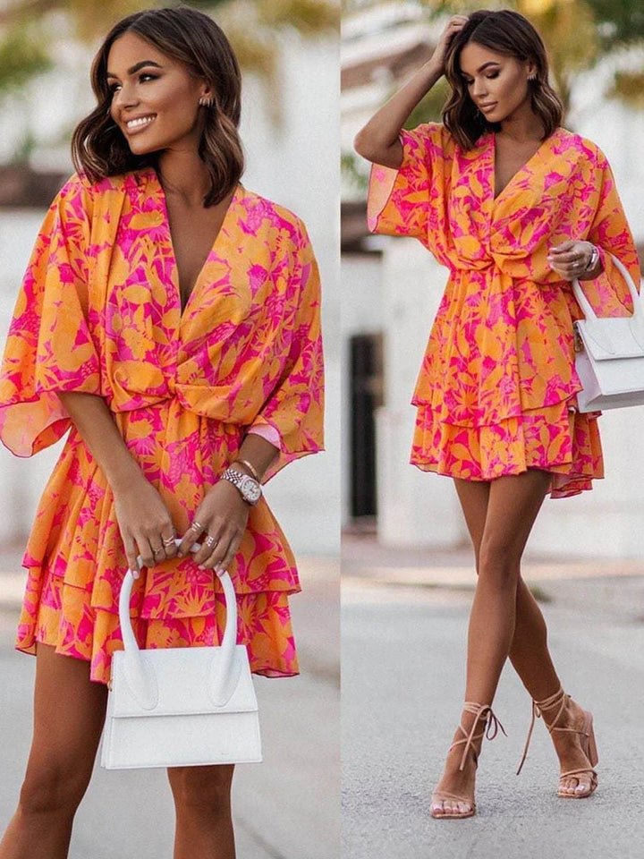 Elegant women's V-neck mini dress, perfect for chic summer parties & versatile style.