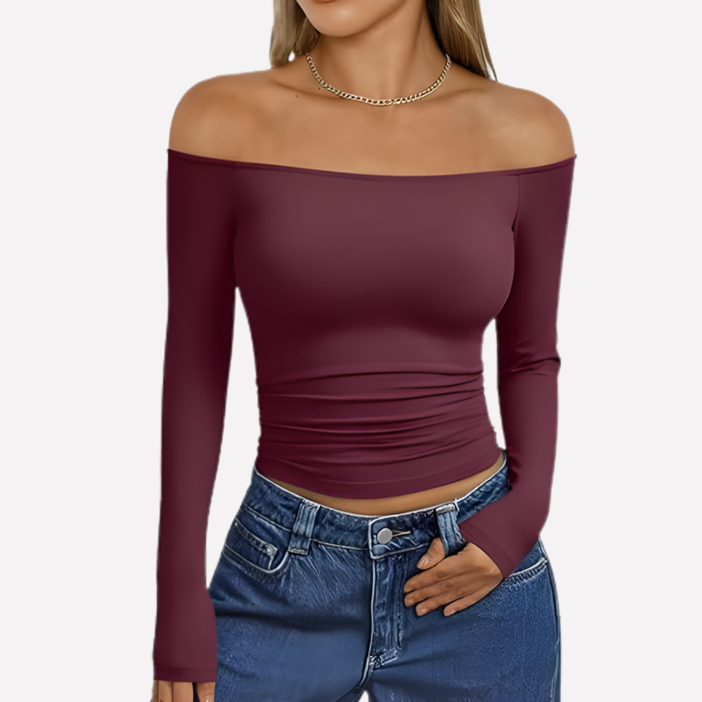 Modern women's off-shoulder long sleeve top, relaxed fit, perfect for a chic and stylish everyday ensemble.