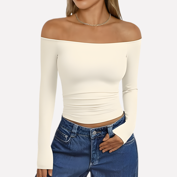 Relaxed fit women's off-shoulder long sleeve top, chic and versatile for spring or fall fashion.