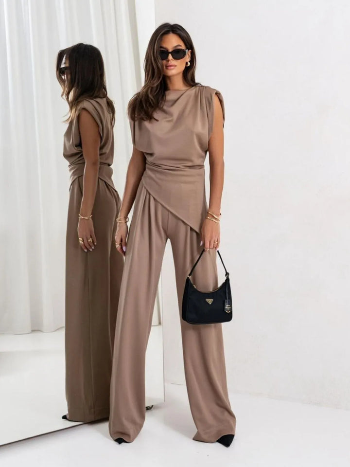Elegant wide leg pants and asymmetrical top matching set for women