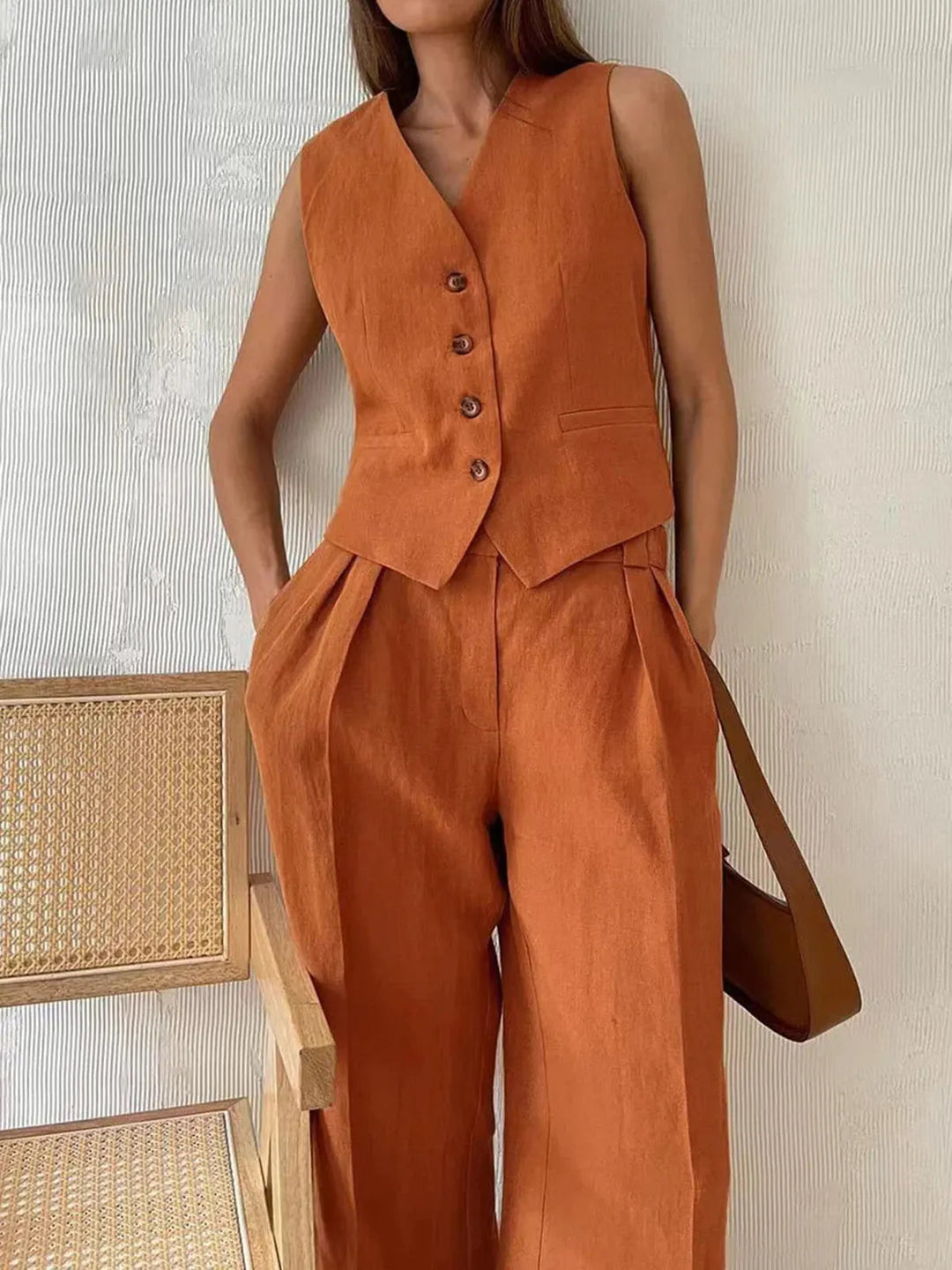 Stylish women's black two-piece set: comfortable cotton linen waistcoat and pants.