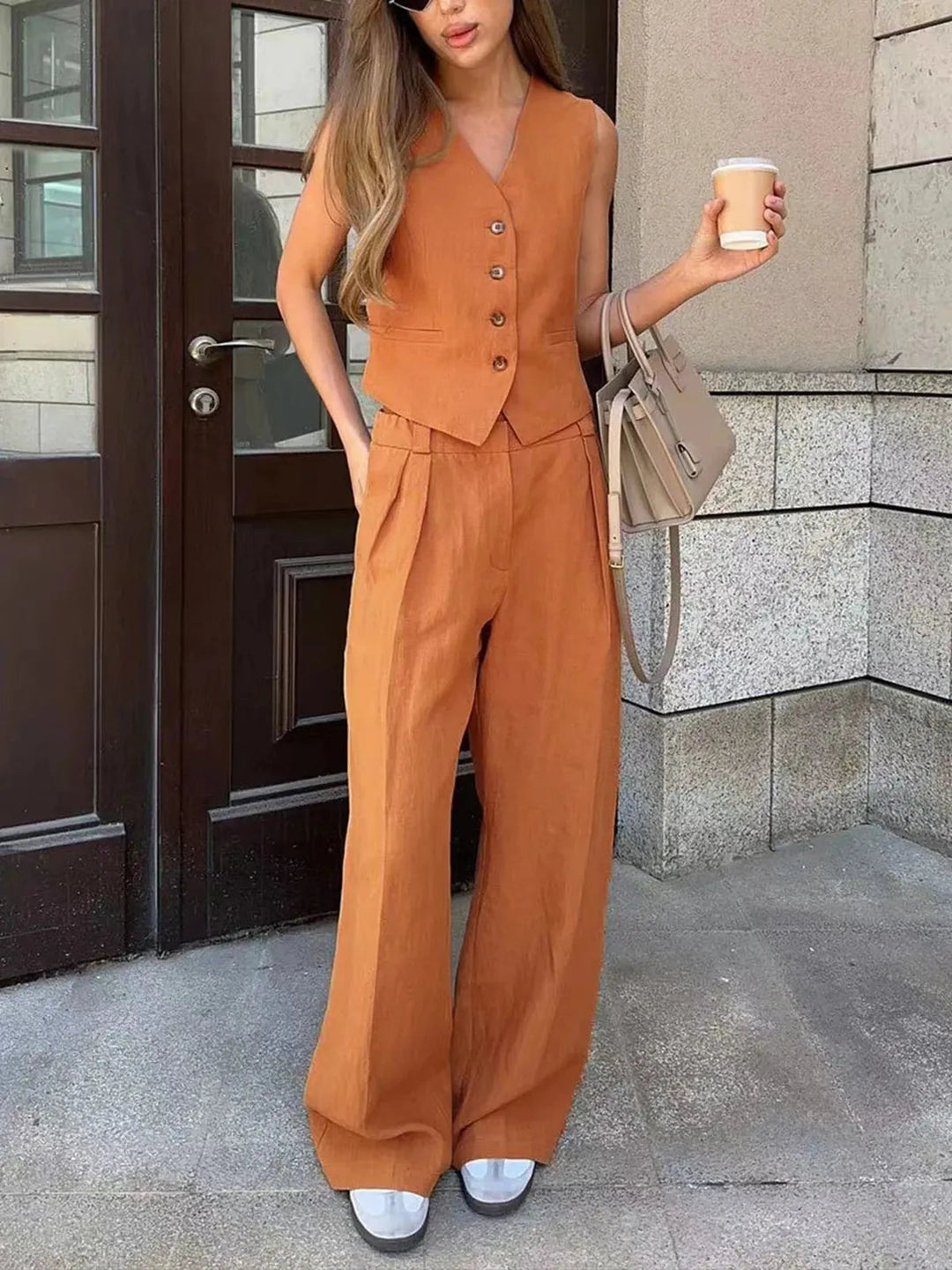 Women's summer set in vibrant orange, made from breathable cotton linen blend.