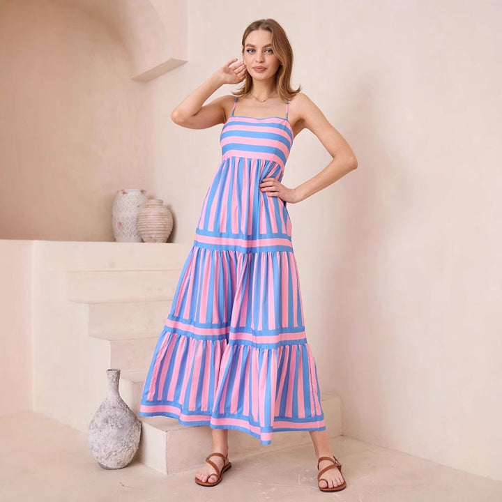 Long flowing summer dress for women, featuring a stylish stripe pattern and tiered design.
