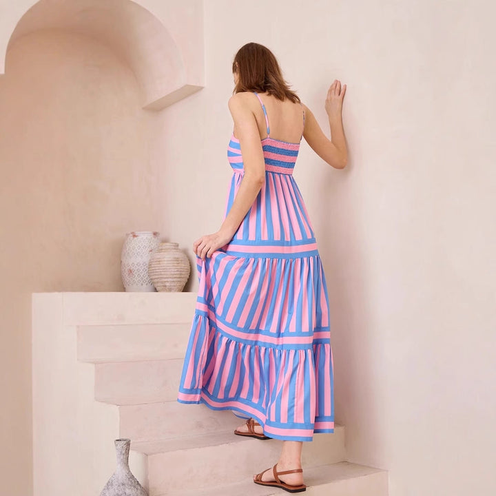 Casual women's sundress with a trendy maxi length and vibrant stripes for summer.