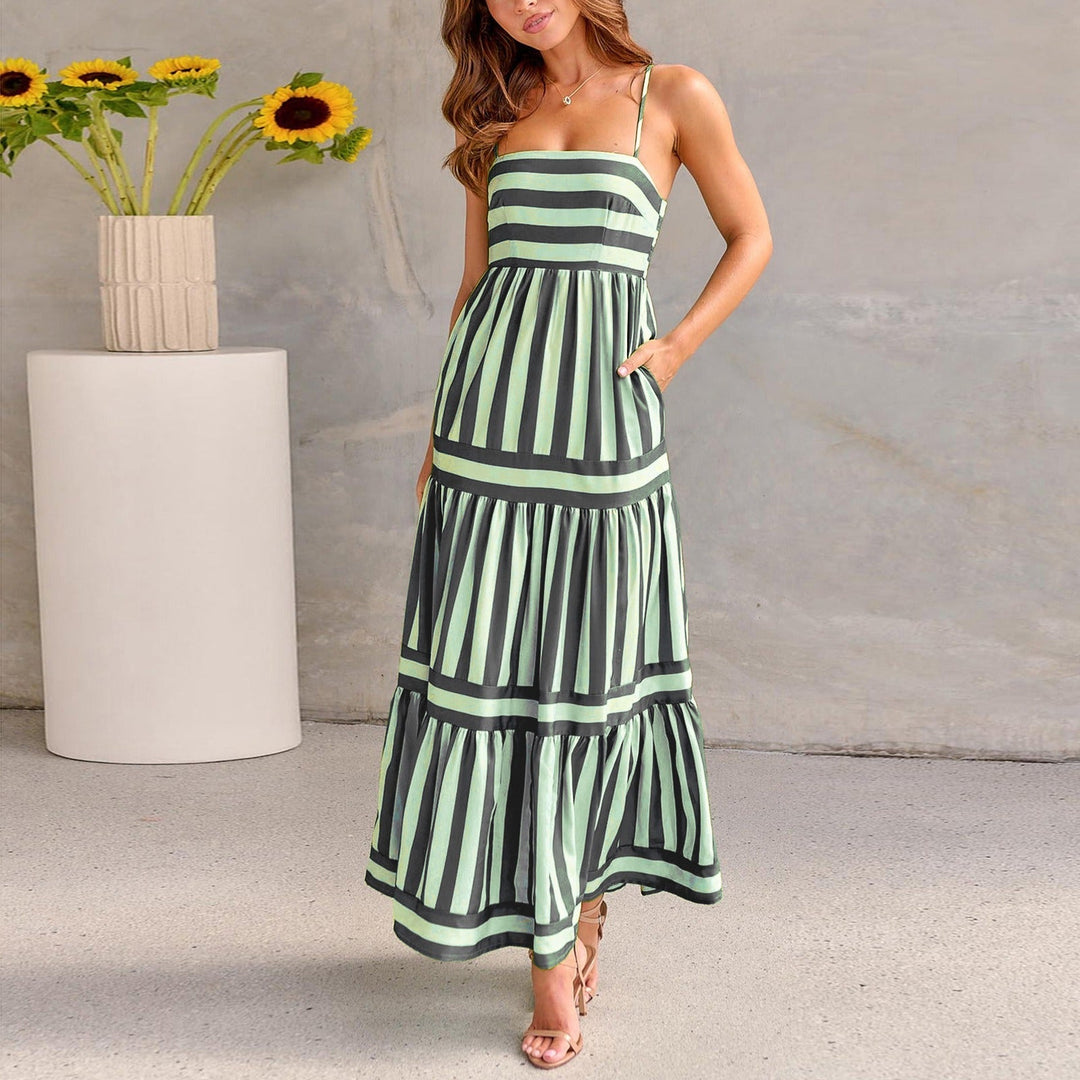 Boho-inspired women's maxi dress in a classic stripe print, ideal for warm weather.
