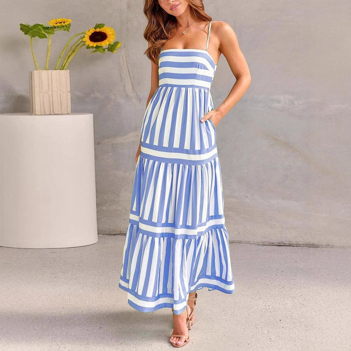 Versatile striped summer dress for women, suitable for beach outings or everyday wear.