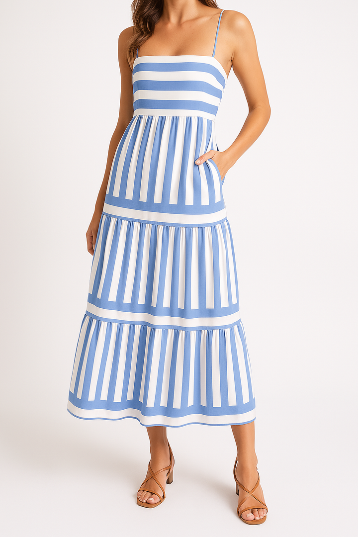 Elegant women's tiered maxi dress with a chic stripe pattern for a fashionable look.