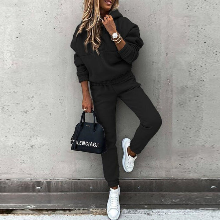 Chic women's two-piece tracksuit set for comfortable everyday wear. Stylish casual lounge wear perfect for active lifestyles.