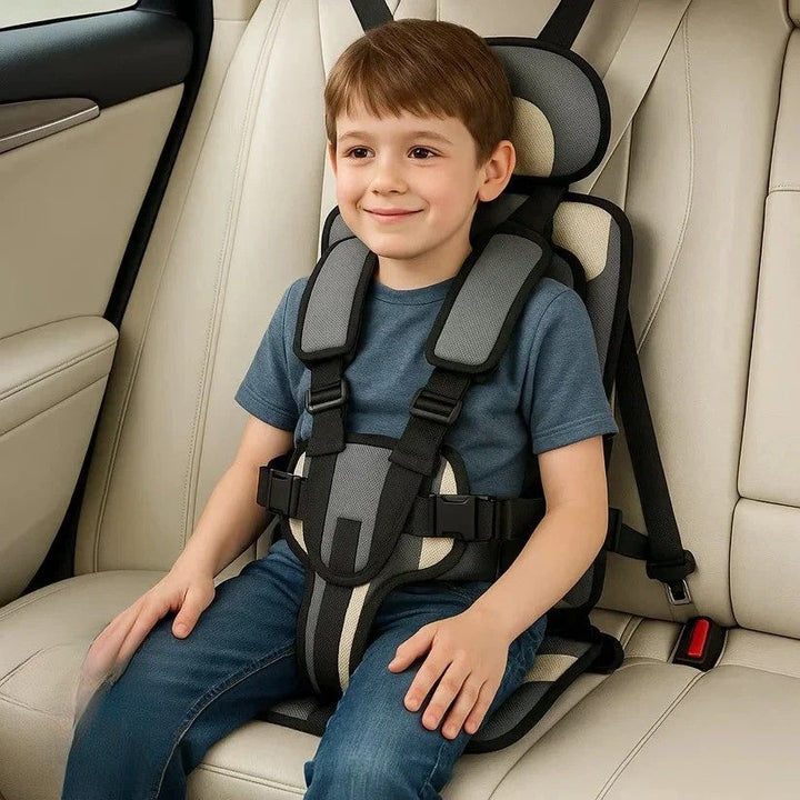 Infant & children's portable car safety seat, foldable for compact travel.