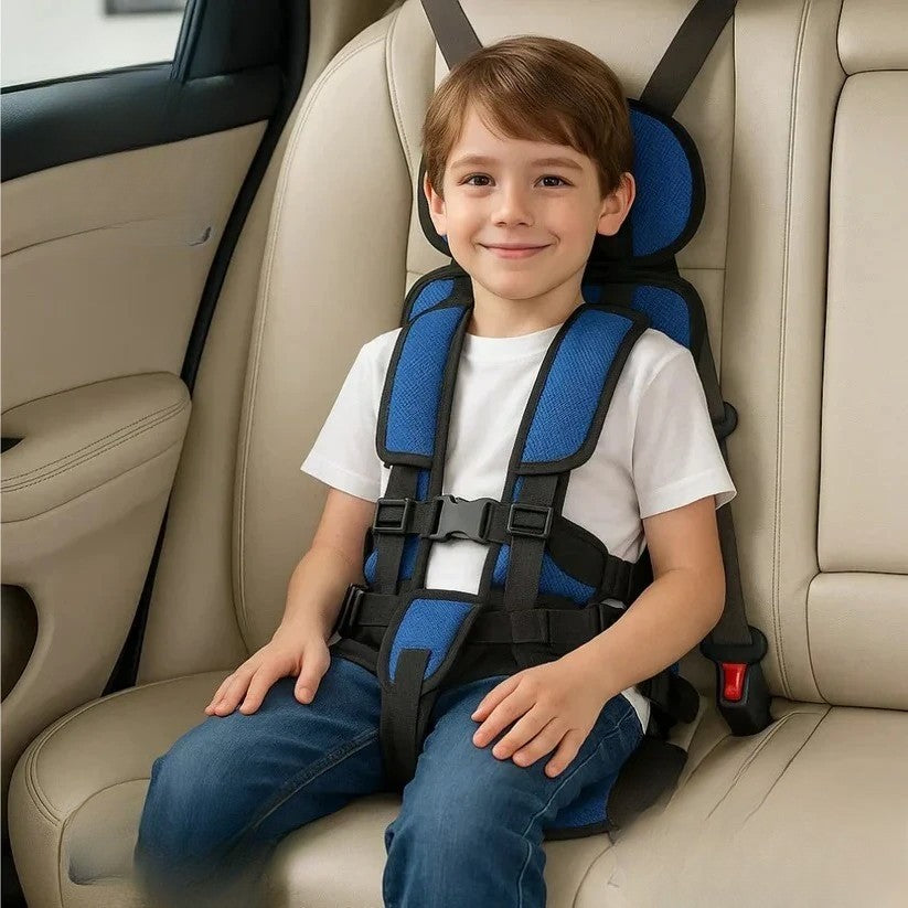 Kids travel car seat, portable & foldable with safety harness for road trips.