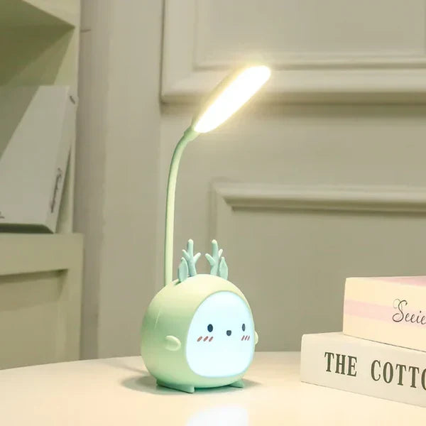 Portable USB children's night light & reading lamp, cute cartoon design, safe for kids' rooms.