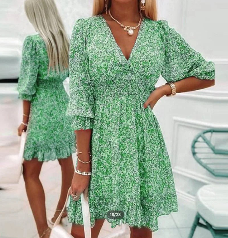 Multicoloured women's relaxed fit casual dress, a vibrant and flowy short sleeve option for summer & beachwear.