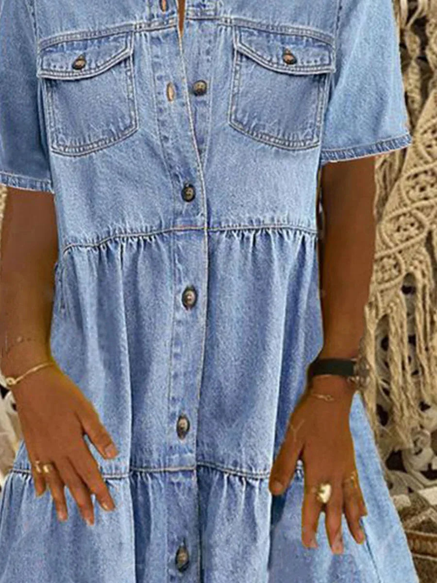 Relaxed fit women's casual shirt dress. Button-front and tiered design, ideal for chic everyday summer fashion.