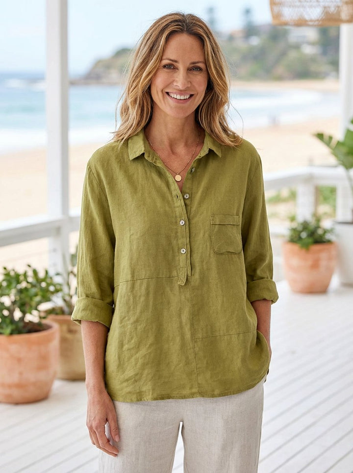 Women's classic relaxed fit button-front shirt for warm days, long sleeve, comfortable & versatile everyday wear.