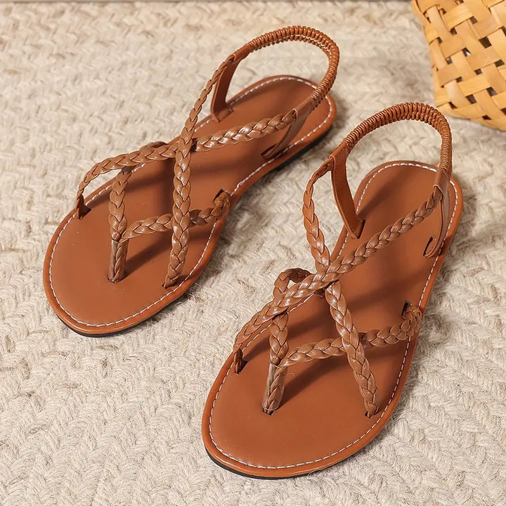 Versatile women's braided flat sandals with toe ring, great for beach, casual, or vacation.
