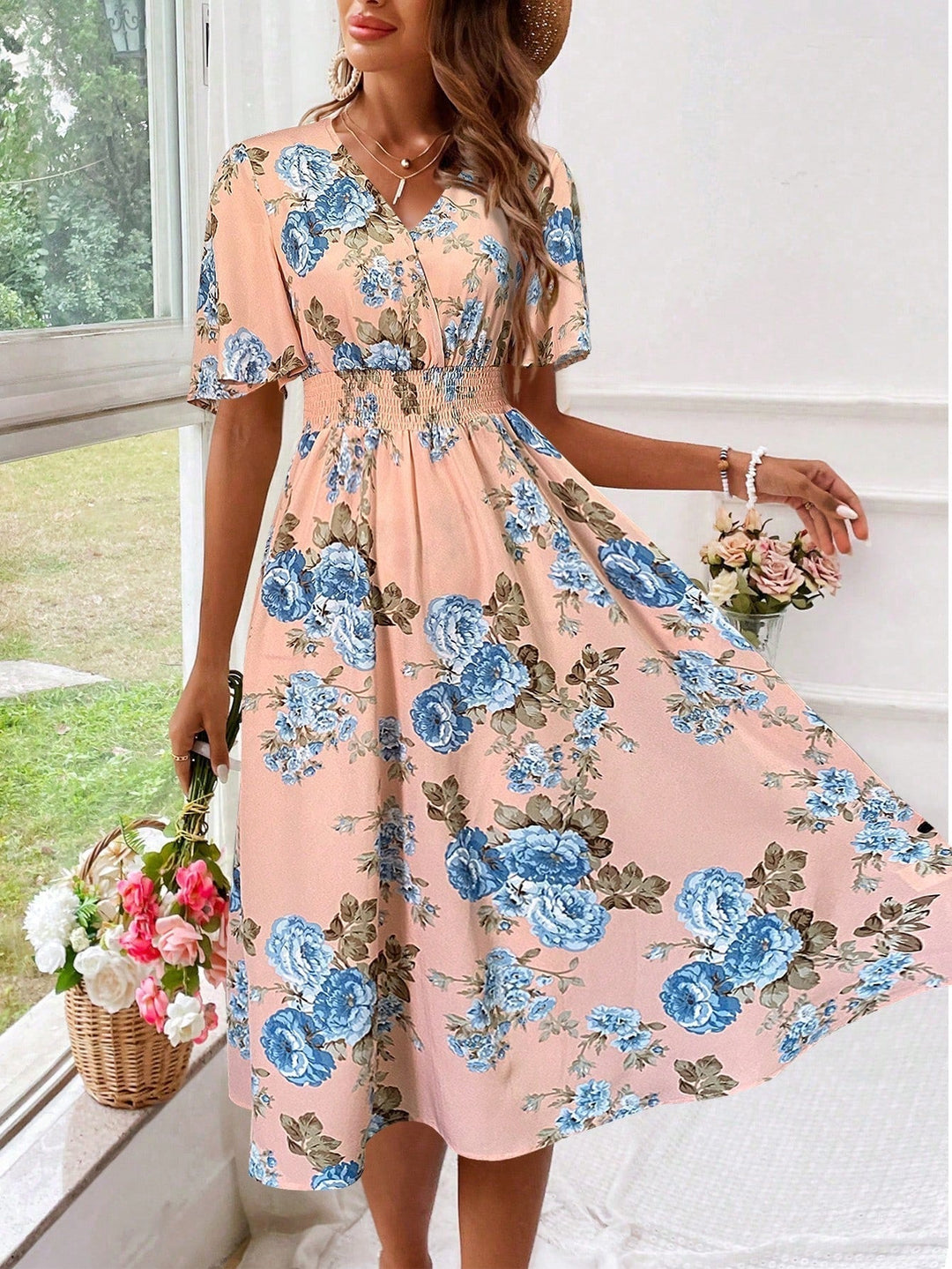 Versatile women's floral midi dress with flutter sleeves, ideal for brunch, parties, or everyday chic.