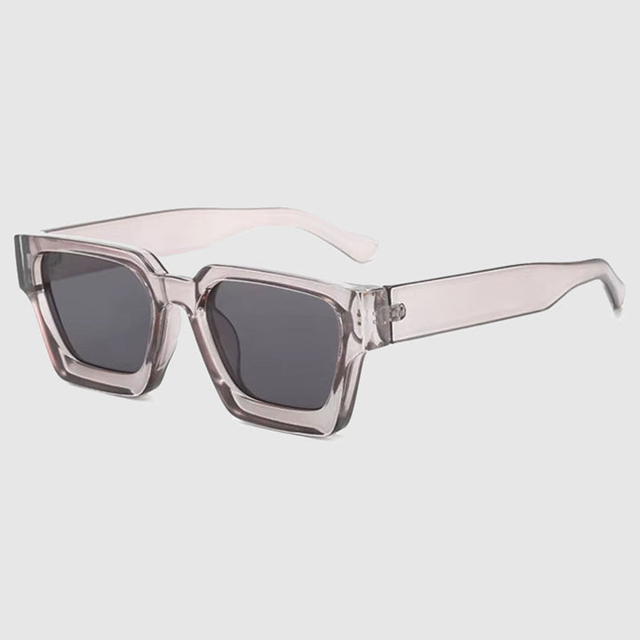 Unisex chunky square eyewear with modern tinted lenses, a stylish accessory for any fashion-forward look.