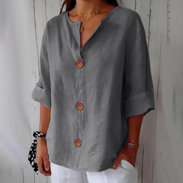 Relaxed fit women's oversized button-front top, a chic and casual everyday blouse.