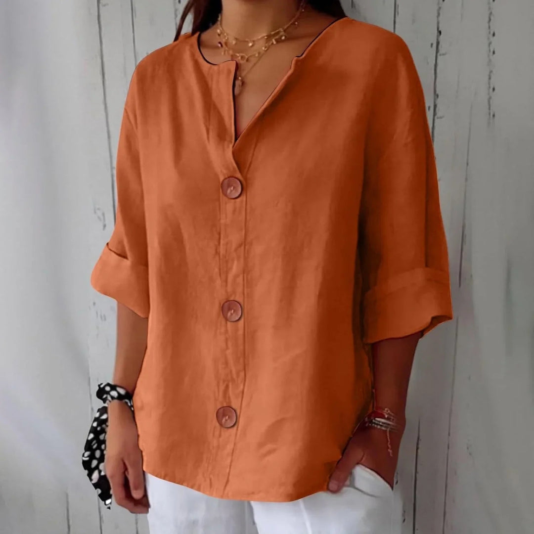 Fashionable oversized button-front top for women, perfect for chic & comfortable wear.