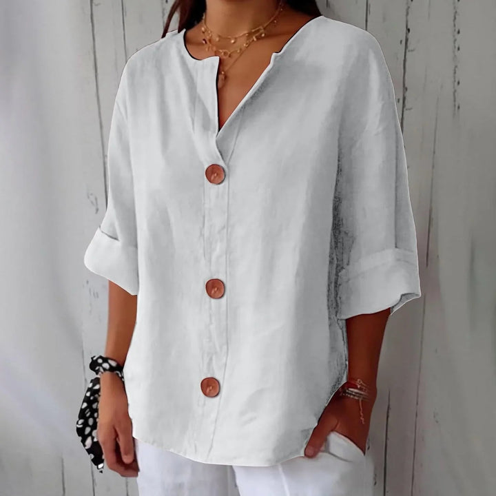 Chic oversized button-front blouse for women, perfect for spring & summer comfort.