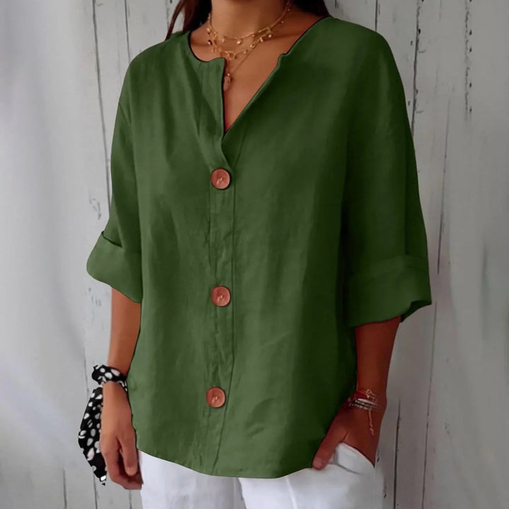 Stylish women's oversized top, a button-front blouse ideal for spring casual outfits.