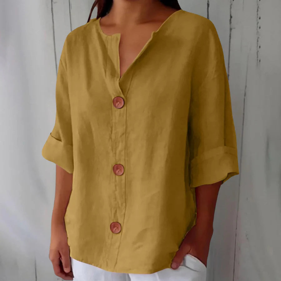 Women's comfortable oversized button-front top, a versatile spring/summer blouse.