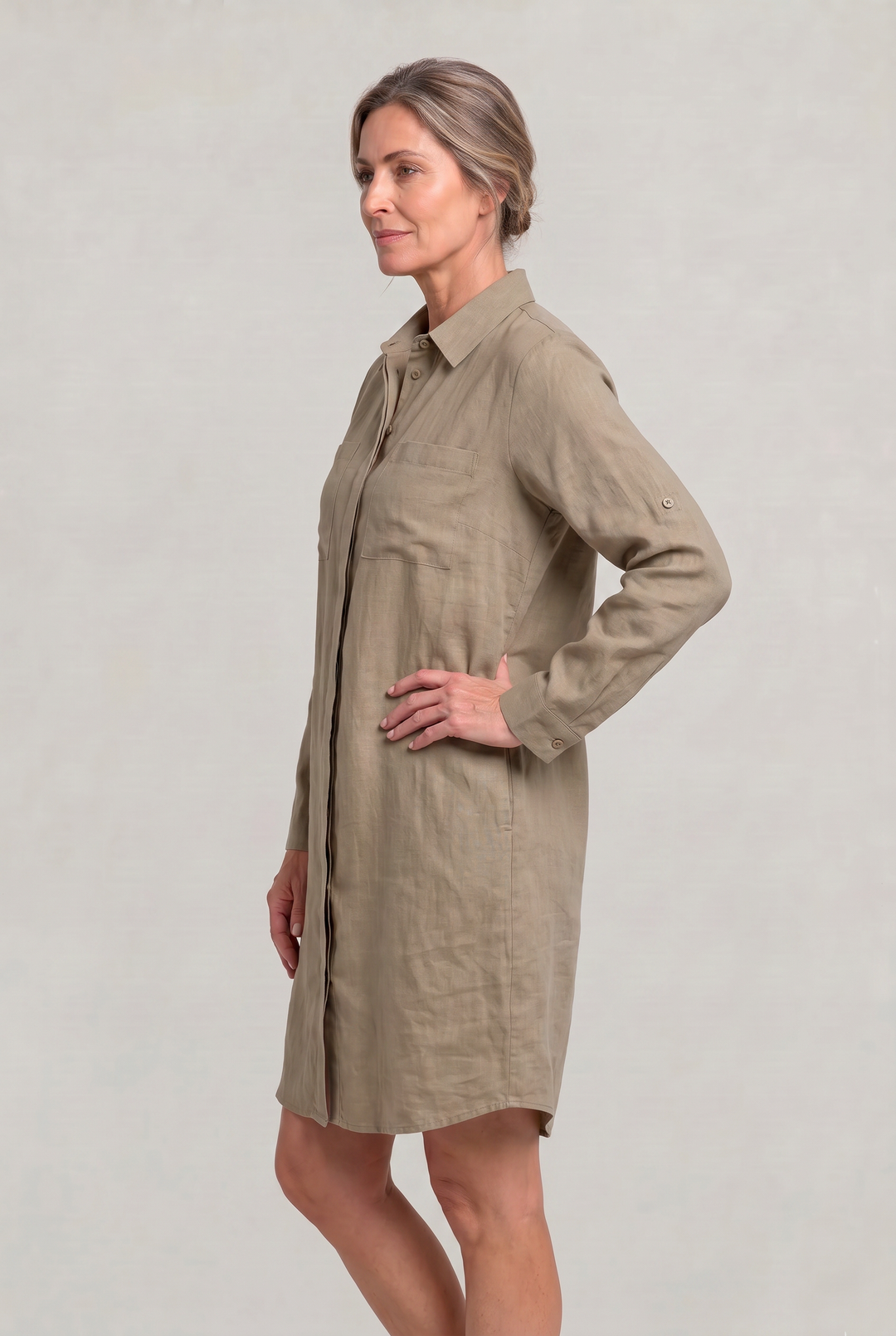 Relaxed fit long-sleeve button-down shirt dress for women. Ideal versatile casual wear.