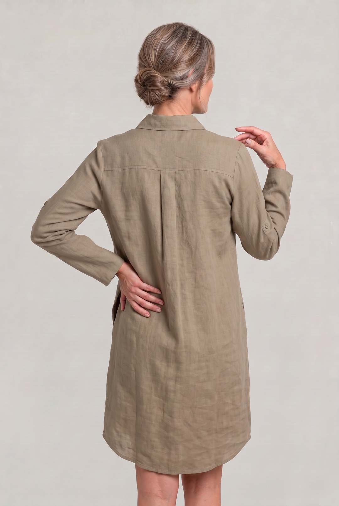 Versatile long-sleeve oversized shirt dress for women. Button-down style, perfect for casual summer days.